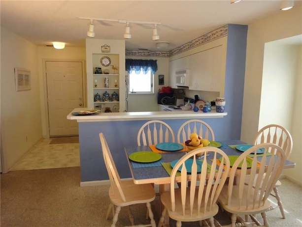 Imagen de la habitación del Hotel Pirate's Cove Resort Condos. Foto 16