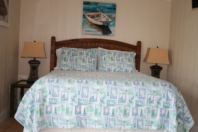 Imagen de la habitación del Hotel Pirate's Pointe Fishing Resort. Foto 10