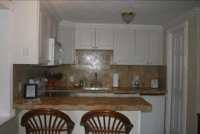 Imagen de la habitación del Hotel Pirate's Pointe Fishing Resort. Foto 13