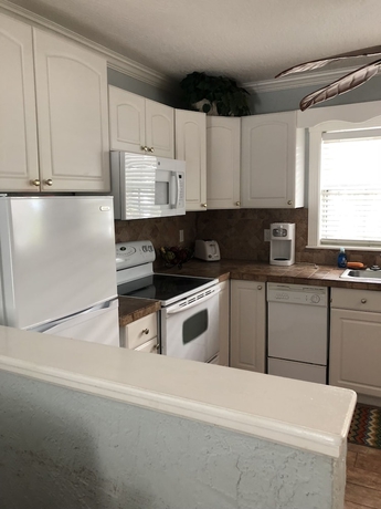 Imagen de la habitación del Hotel Pirate's Pointe Fishing Resort. Foto 16