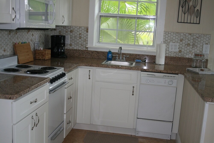 Imagen de la habitación del Hotel Pirate's Pointe Fishing Resort. Foto 17