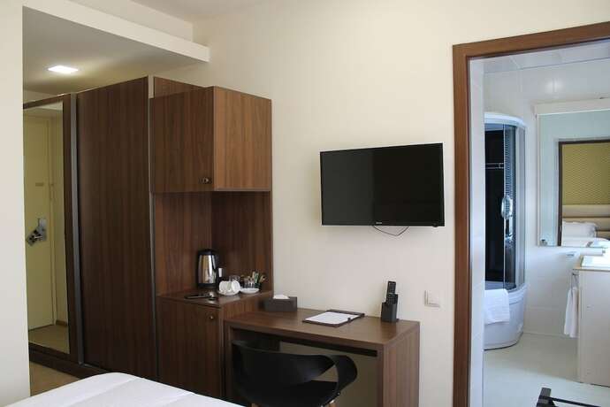 Imagen de la habitación del Hotel Pirimze Plaza. Foto 11