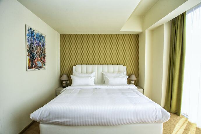 Imagen de la habitación del Hotel Pirimze Plaza. Foto 13
