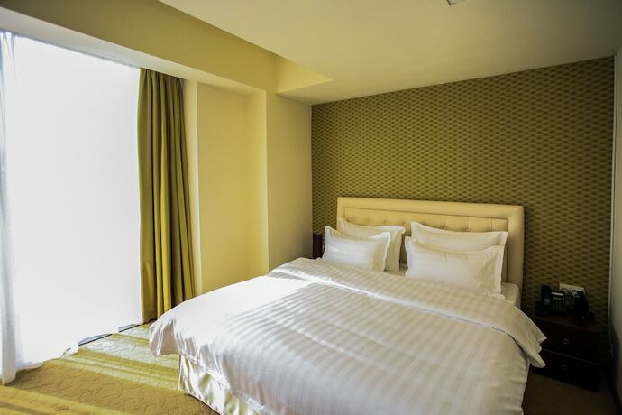 Imagen de la habitación del Hotel Pirimze Plaza. Foto 18