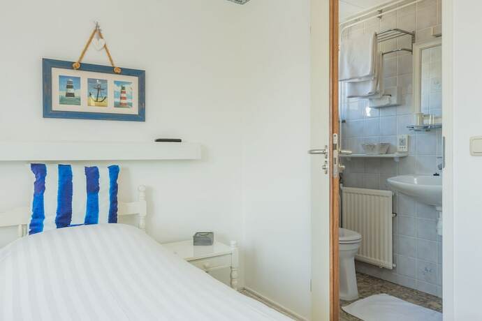 Imagen de la habitación del Hotel Pirombo Bed and Breakfast. Foto 19