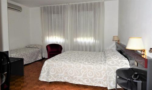 Imagen de la habitación del Hotel Pittini. Foto 8