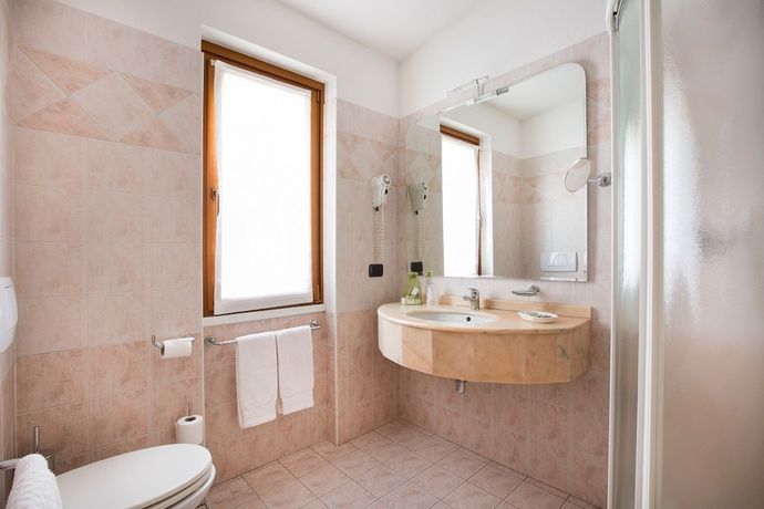 Imagen de la habitación del Hotel Piuro. Foto 4