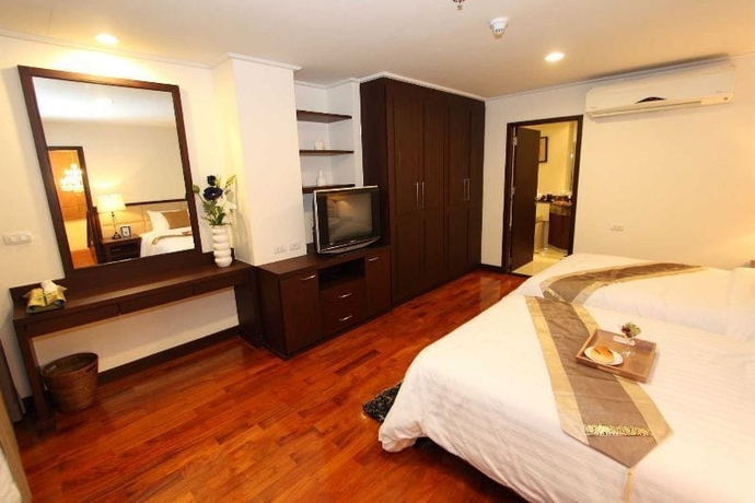 Imagen de la habitación del Hotel Piyathip Place. Foto 10