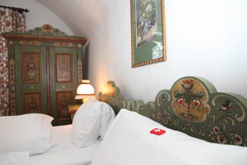 Imagen de la habitación del Hotel Piz Ela. Foto 11