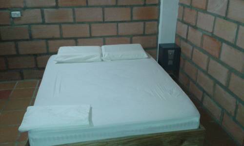 Imagen de la habitación del Hotel Pizzeria Opera Tolu. Foto 4