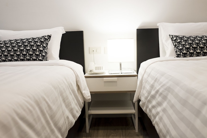 Imagen de la habitación del Hotel Pj Inn Pattaya. Foto 3