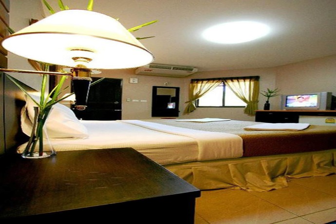 Imagen de la habitación del Hotel Pk Mansion. Foto 8