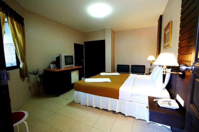 Imagen de la habitación del Hotel Pk Mansion. Foto 9