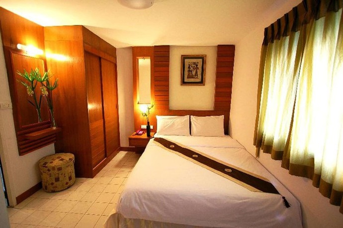 Imagen de la habitación del Hotel Pk Mansion. Foto 10