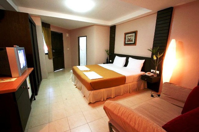 Imagen de la habitación del Hotel Pk Mansion. Foto 11