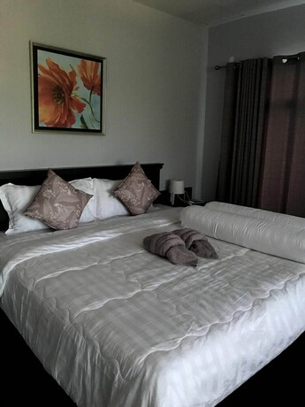 Imagen de la habitación del Hotel Pk Villa. Foto 19