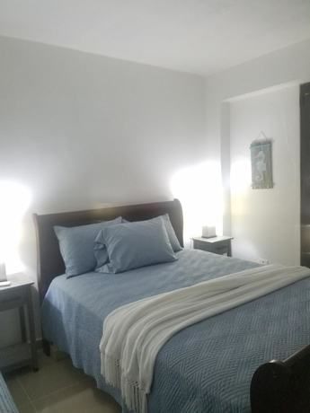 Imagen de la habitación del Hotel Placid Suites. Foto 8