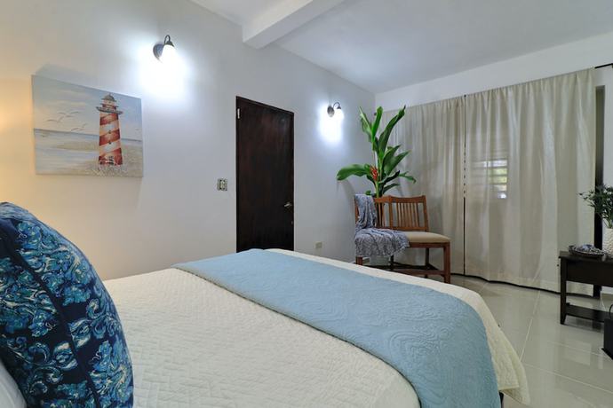 Imagen de la habitación del Hotel Placid Suites. Foto 13