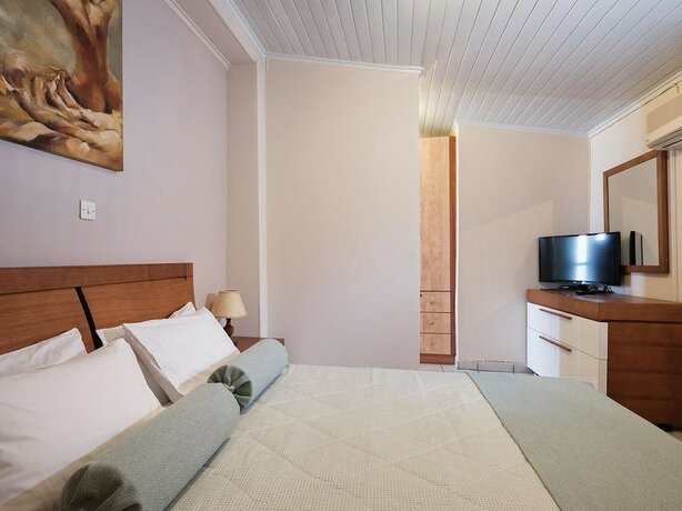 Imagen de la habitación del Hotel Plaka Beach Resort. Foto 19
