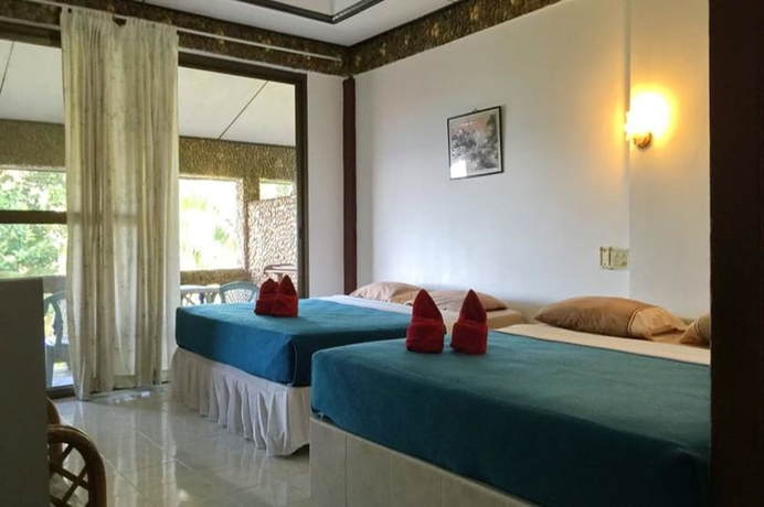 Imagen de la habitación del Hotel Plaloma Cliff Resort. Foto 18