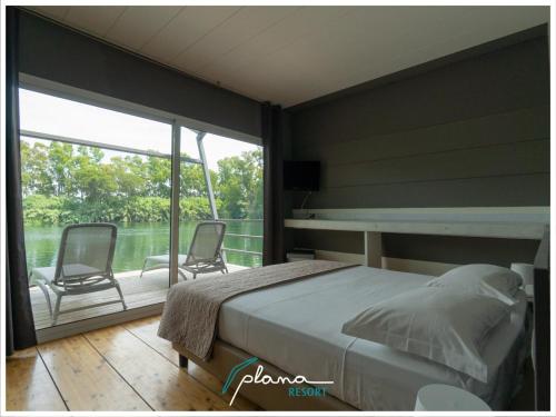 Imagen de la habitación del Hotel Plana Resort & SPA. Foto 8