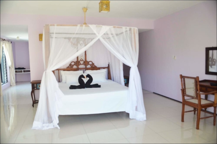 Imagen de la habitación del Hotel Planet Apartments, ziwa La Ng'ombe ward. Foto 8