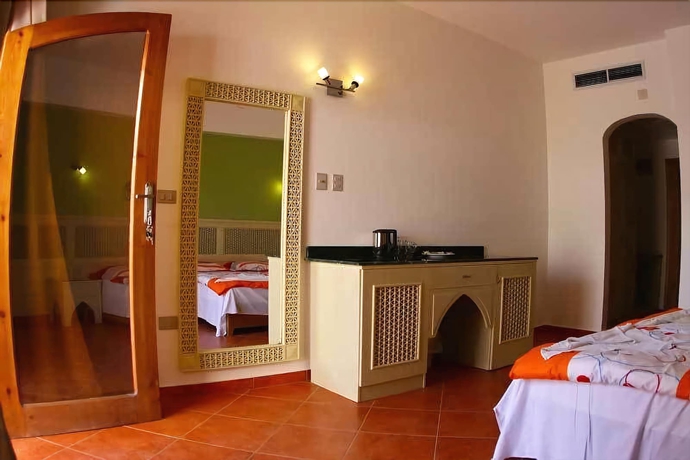 Imagen de la habitación del Hotel Planet Oasis. Foto 6