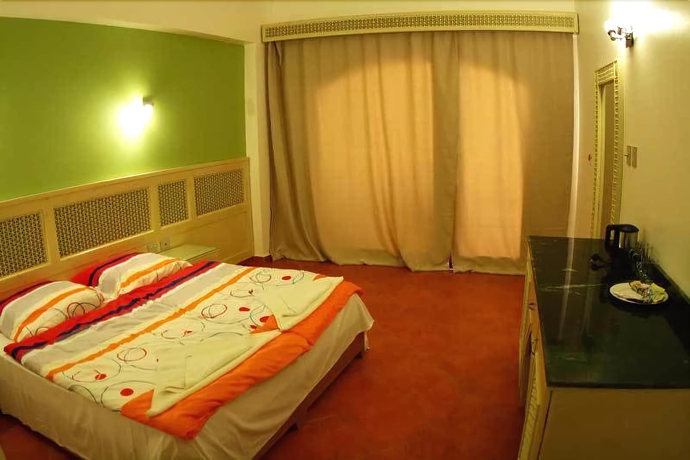 Imagen de la habitación del Hotel Planet Oasis. Foto 14