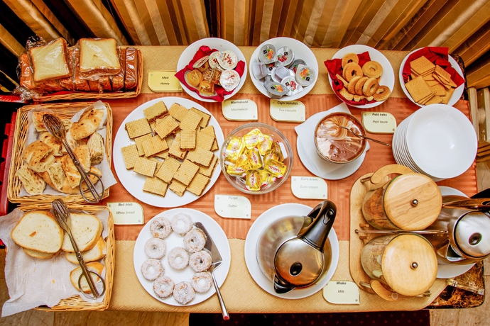 Imagen del bar/restaurante del Hotel Planeta Inn. Foto 2