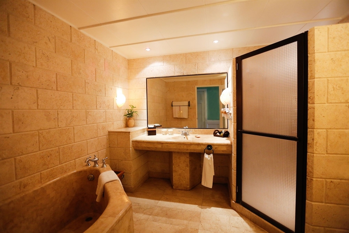 Imagen de la habitación del Hotel Plantation Bay Resort and Spa. Foto 7