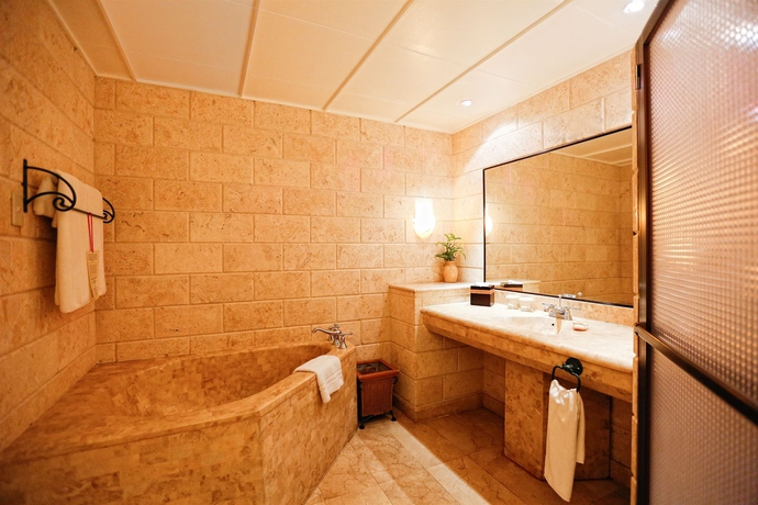 Imagen de la habitación del Hotel Plantation Bay Resort and Spa. Foto 8