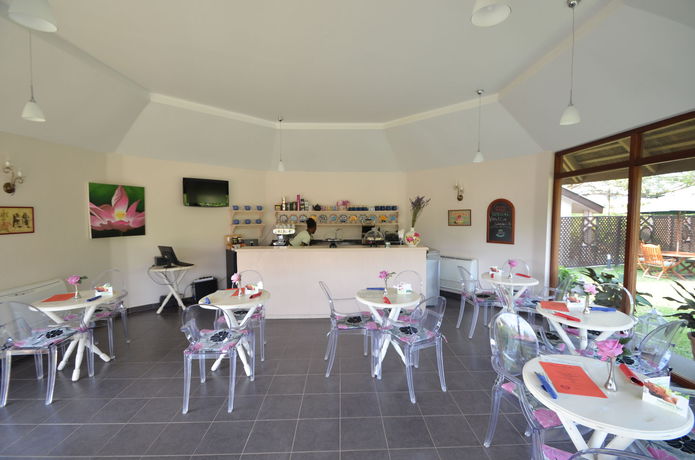Imagen de la habitación del Hotel Planters Lodge and Spa. Foto 11