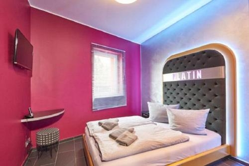 Imagen de la habitación del Hotel Platin. Foto 9