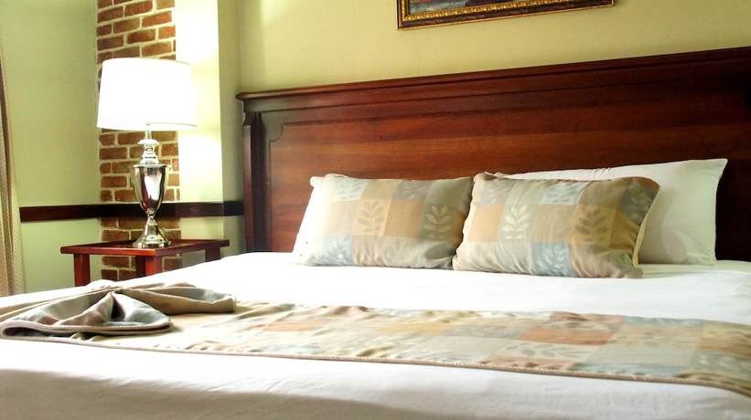 Imagen de la habitación del Hotel Platino and Casino. Foto 13