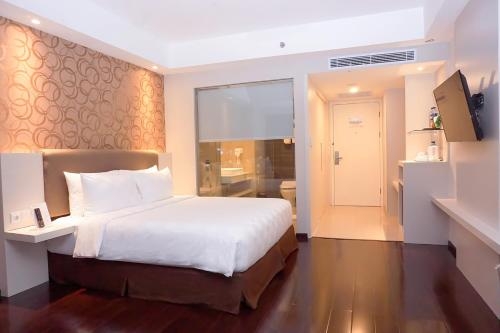 Imagen de la habitación del Hotel Platinum Adisucipto and Conference. Foto 6