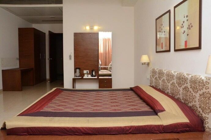 Imagen de la habitación del Hotel Platinum Inn. Foto 22