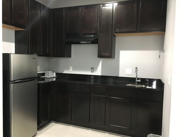Imagen de la habitación del Hotel Platinum Inn and Suites. Foto 3