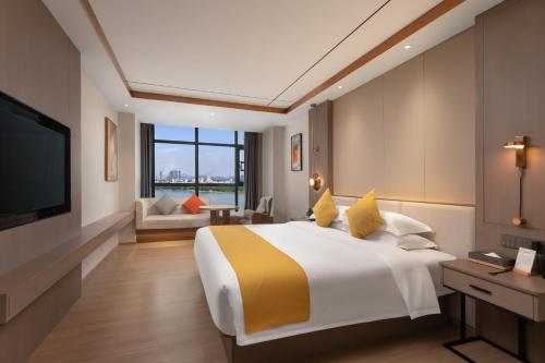 Imagen de la habitación del Hotel Platinum International - Hanjiang Branch memorial archway Street Chaozhou Ancient City. Foto 20