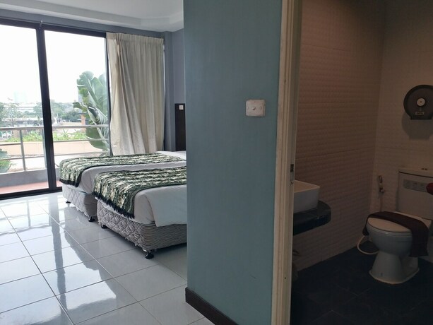 Imagen de la habitación del Hotel Platinum Place. Foto 23