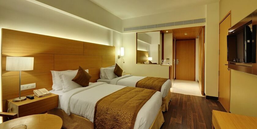 Imagen de la habitación del Hotel Platinum, Rajkot. Foto 17