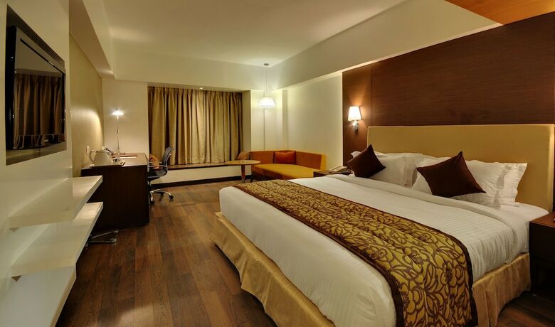 Imagen de la habitación del Hotel Platinum, Rajkot. Foto 18