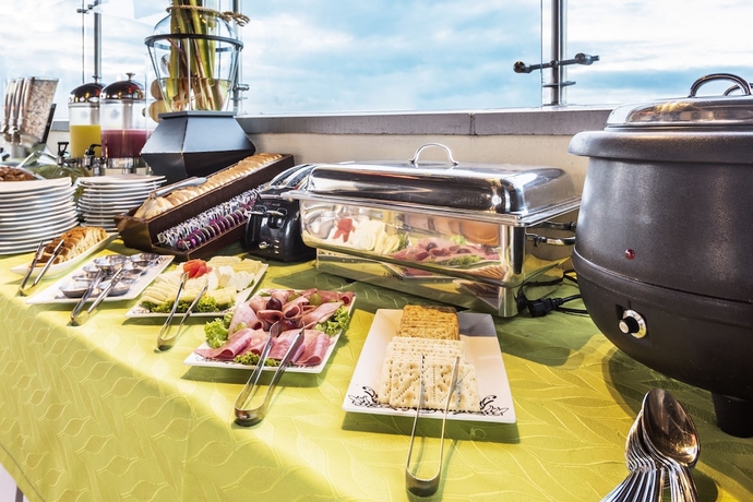 Imagen del bar/restaurante del Hotel Platinum Suite. Foto 5