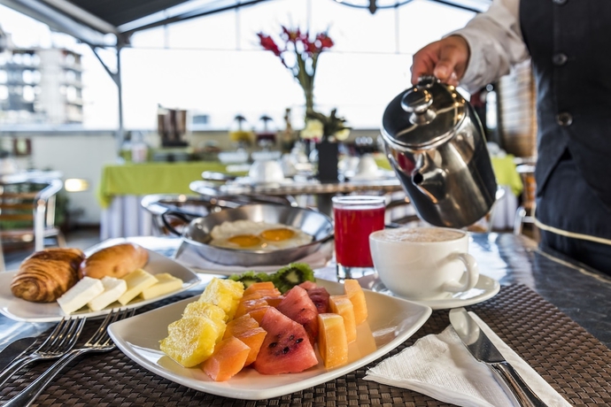 Imagen del bar/restaurante del Hotel Platinum Suite. Foto 6