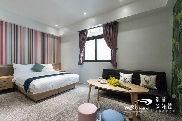 Imagen de la habitación del Hotel Play Inn. Foto 22