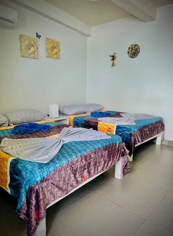 Imagen de la habitación del Hotel Playa Blanca Beach Resort and Dive Centre. Foto 1
