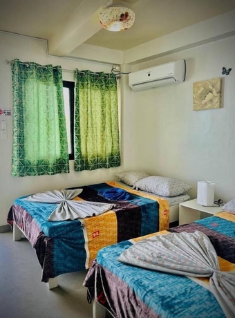 Imagen de la habitación del Hotel Playa Blanca Beach Resort and Dive Centre. Foto 2
