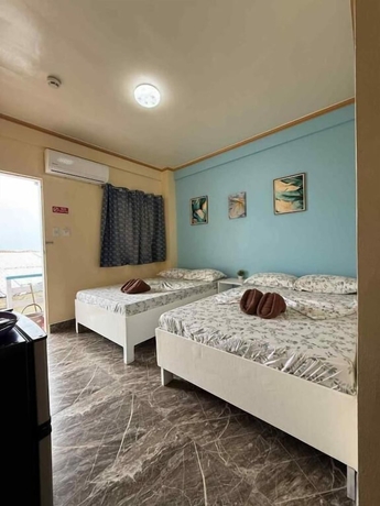 Imagen de la habitación del Hotel Playa Blanca Beach Resort and Dive Centre. Foto 4
