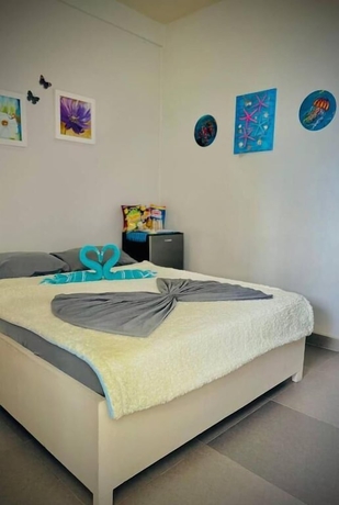 Imagen de la habitación del Hotel Playa Blanca Beach Resort and Dive Centre. Foto 5