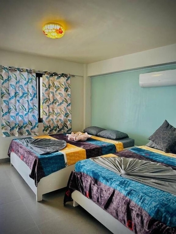 Imagen de la habitación del Hotel Playa Blanca Beach Resort and Dive Centre. Foto 9