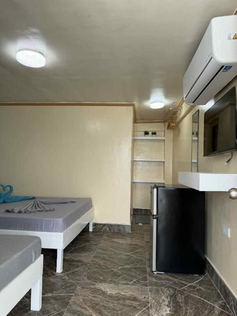 Imagen de la habitación del Hotel Playa Blanca Beach Resort and Dive Centre. Foto 12